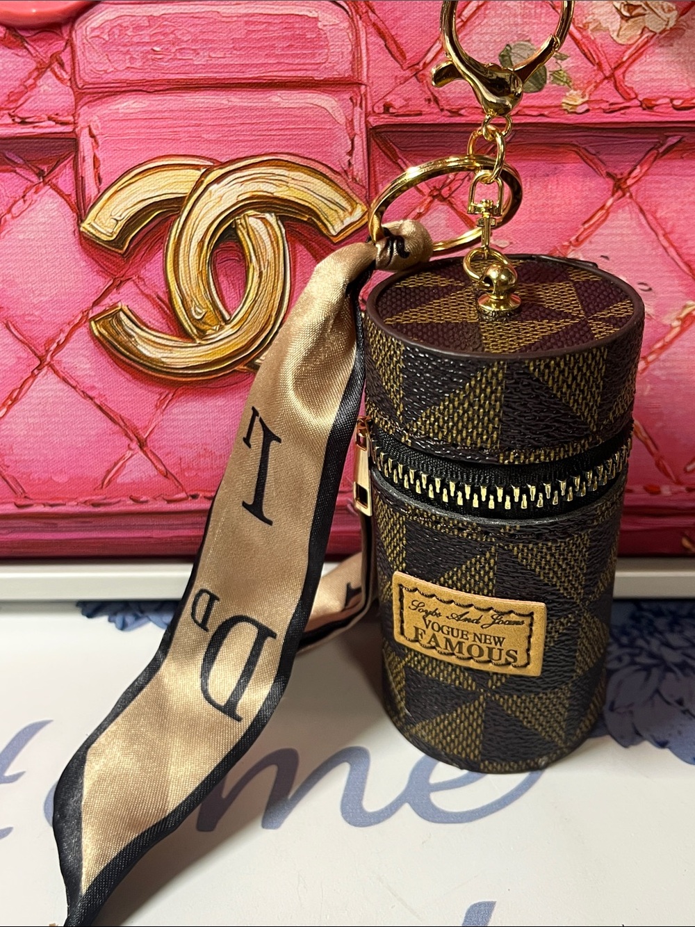 Brown Geometric Mini Cylinder Keychain Pouch with Gold Hardware